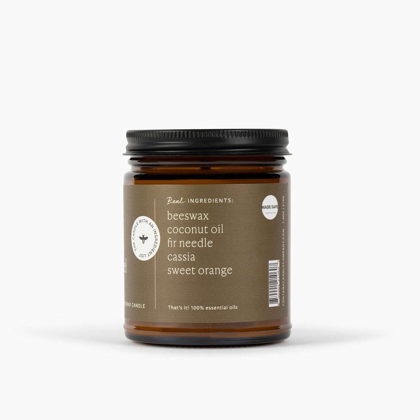 Candle jar with an ingredient label on the side listing beeswax, coconut oil, fir needle, cassia and sweet orange ingredients on a white background.