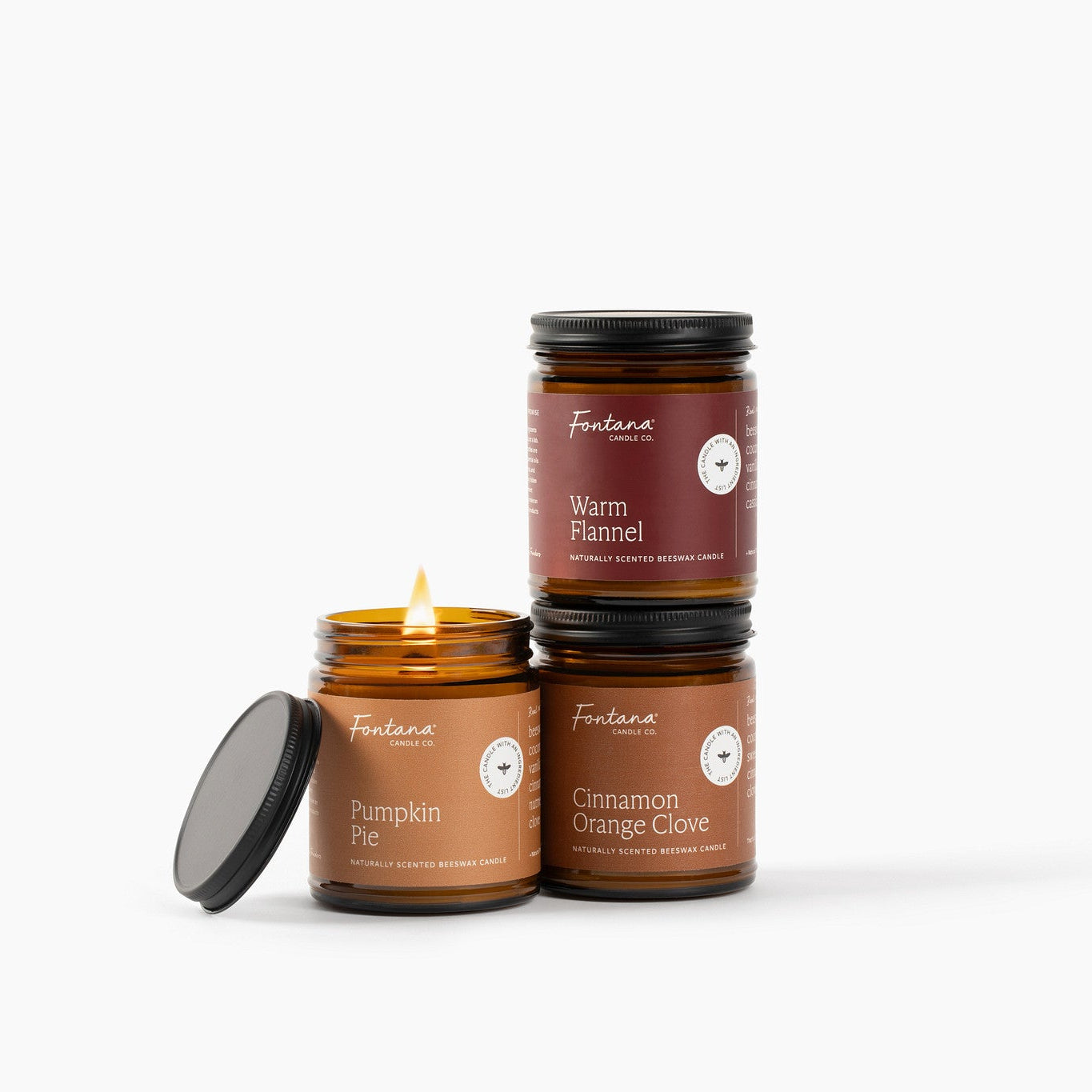 Pumpkin Pie, Warm Flannel and Cinnamon Orange Clove stacked with a white background