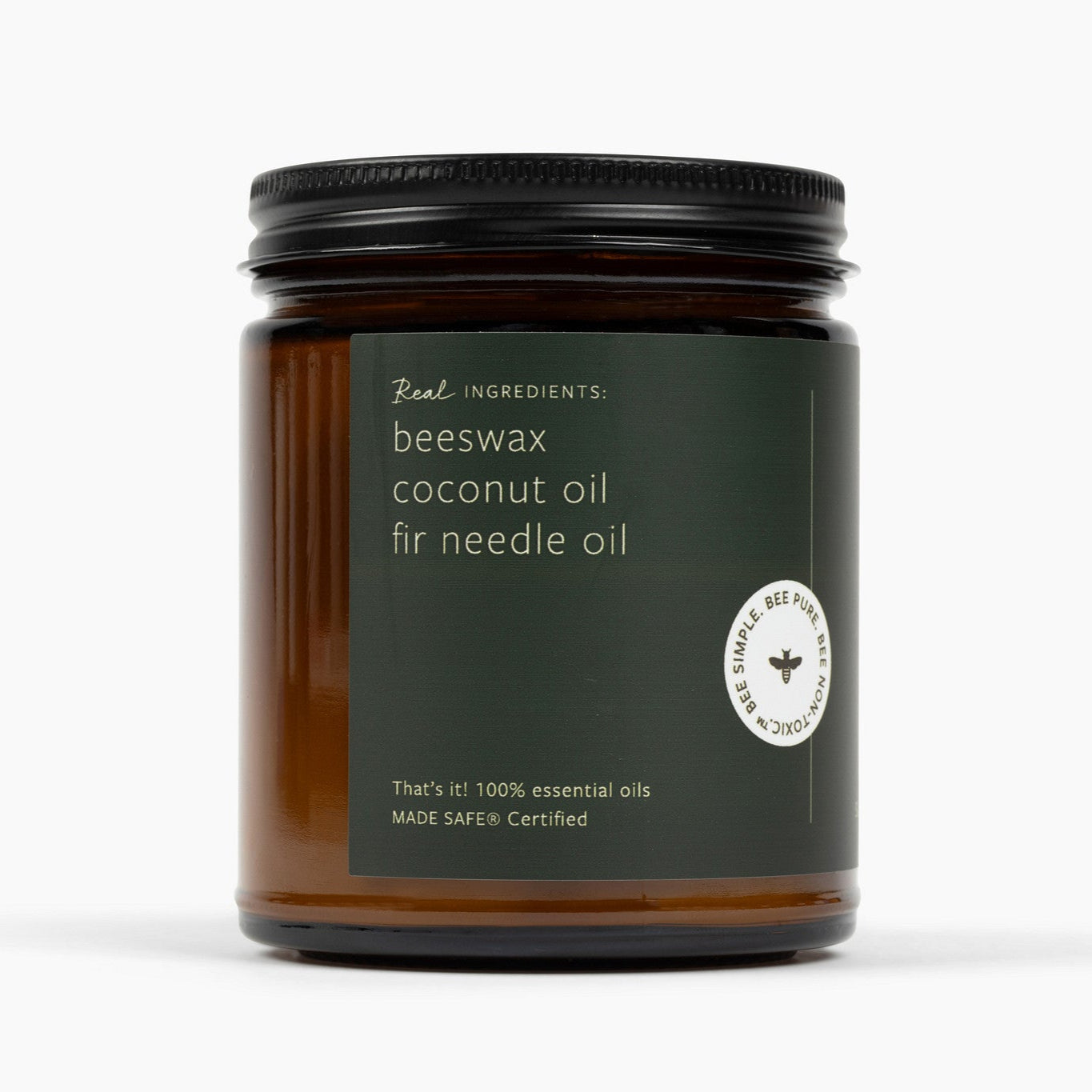 Side view of an amber glass jar with a dark green label and the ingredients: beeswax, coconut oil, and fir needle. 