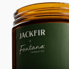 Green candle jar with 'Jackfir' and 'Fontana Candle Co.' branding on a white background