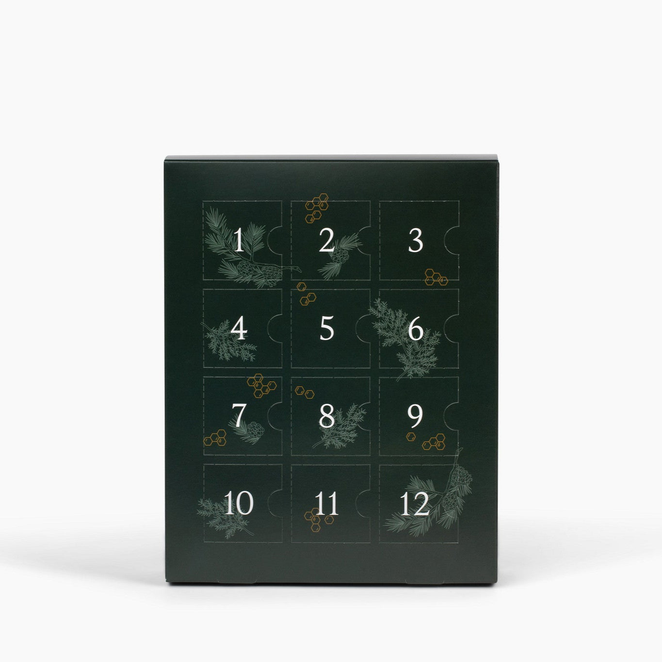 Dark green advent calendar with numbers and evergreen patterns on a white background.