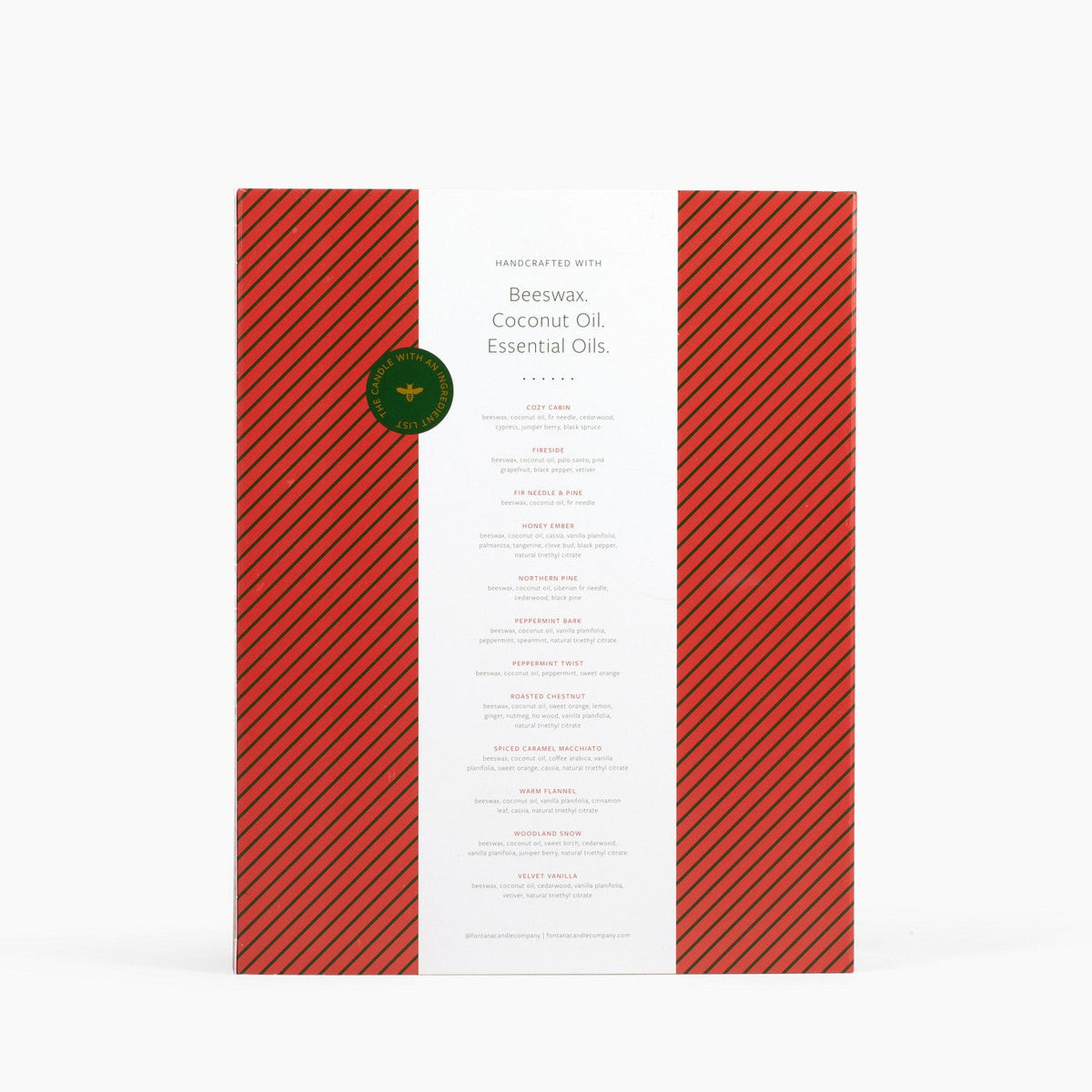 Back view of the advent calendar box, showing all 12 featured scents along with the ingredients on the red and green stripped box, in front of a white background. 