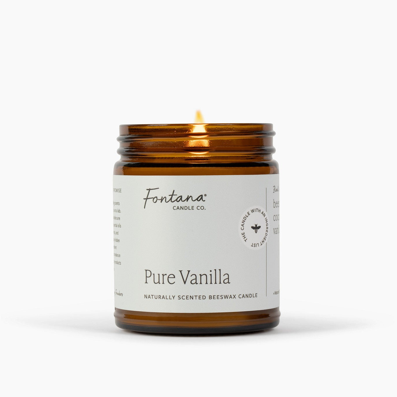 A lit amber glass jar candle with a white label reading 'Fontana Candle Co. Pure Vanilla' on a clean white background.