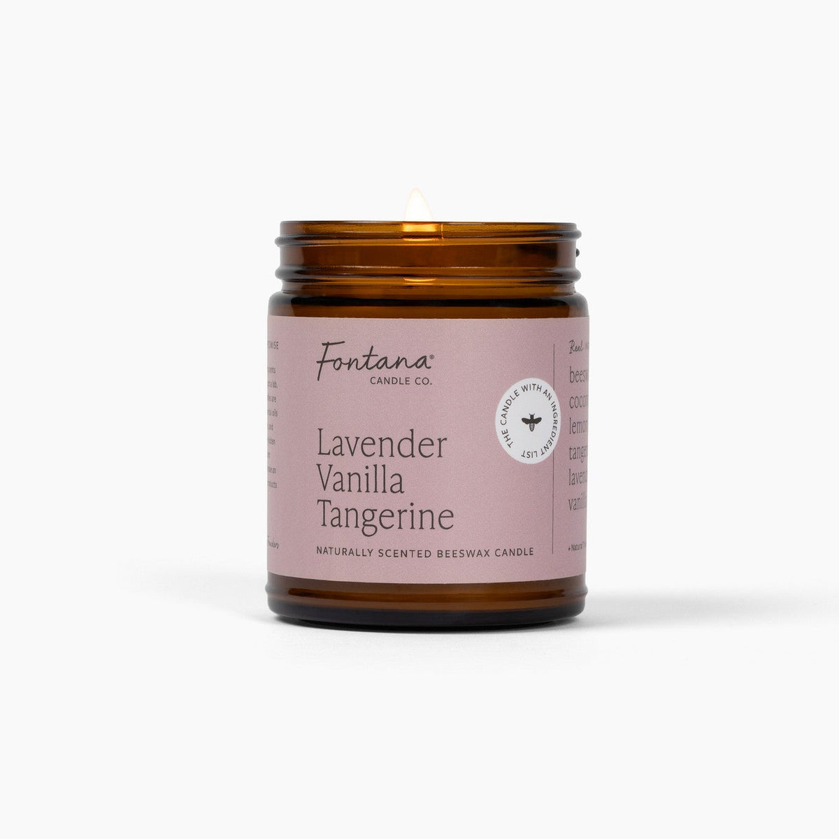 front view of the lavender vanilla tangerine 9oz jar candle, showing the scent name and fontana label
