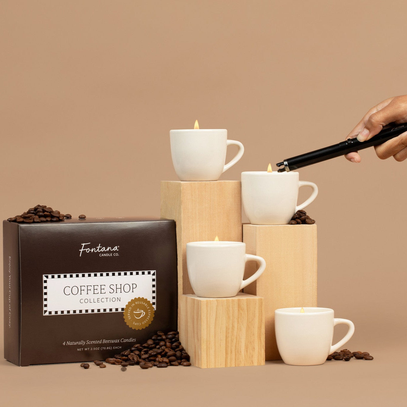 Fontana Coffee Shop packaging with 4 lit coffee cup candles and coffee beans on a beige background