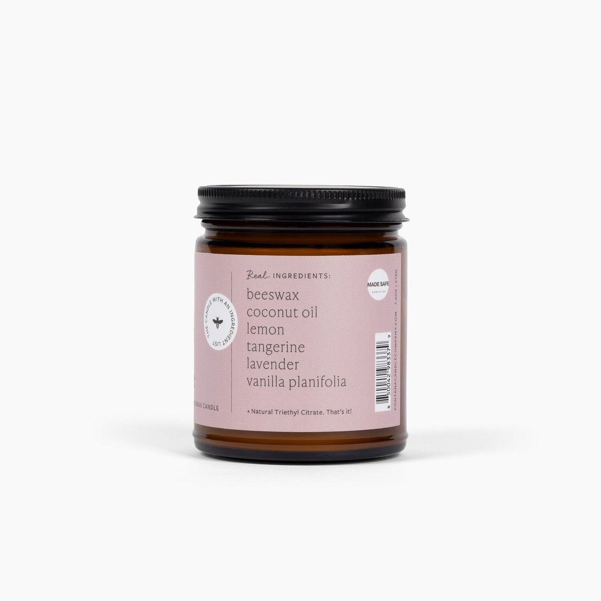 side view of the lavender vanilla tangerine 9oz jar candle, showing the ingredients in the candle